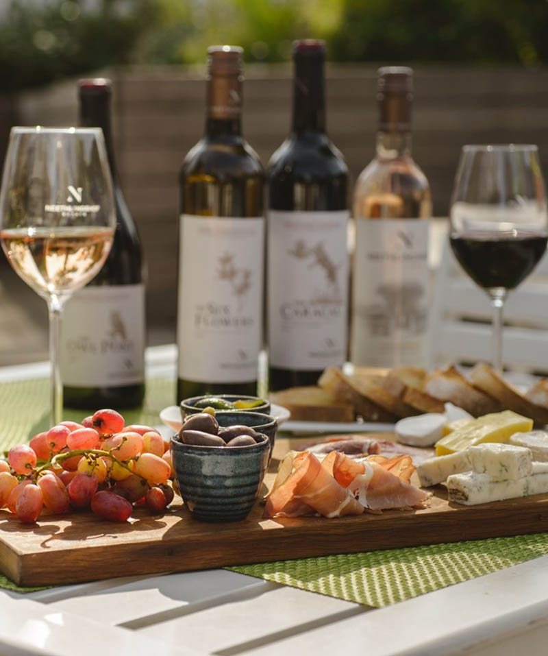 Neethlingshof wine tasting cheese and charcuterie